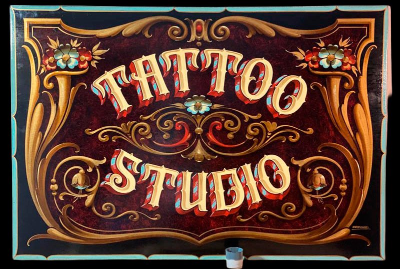 cartel pequeño tattoo estudio