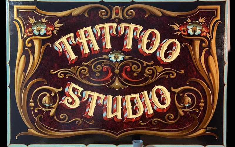 cartel pequeño tattoo estudio