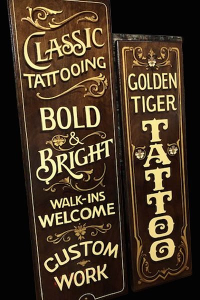 carteleria estudio de tattoo golden tiger